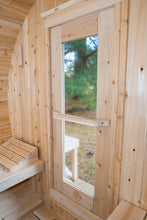 Load image into Gallery viewer, Inside the Dundalk Leisurecraft Canadian Timber Serenity Barrel Sauna, looking outside from the door