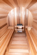 Load image into Gallery viewer, Inside the Dundalk Leisurecraft Canadian Timber Tranquility Barrel Sauna, viewing a backrest, 6KW Heater, water bucket, and ladle