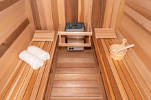 Load image into Gallery viewer, Inside the Dundalk Leisurecraft Tranquility Barrel Sauna viewing the 6KW Heater, water bucket with ladle and towels