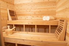 Load image into Gallery viewer, Inside the Dundalk Leisurecraft Canadian Timber Luna Sauna, viewing the top and bottom benches, backrests, water bucket with ladle, and towels