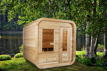 Load image into Gallery viewer, Dundalk Leisurecraft Canadian Timber Luna Sauna sitting outside facing right in a gorgeous backyard with a pond in the back