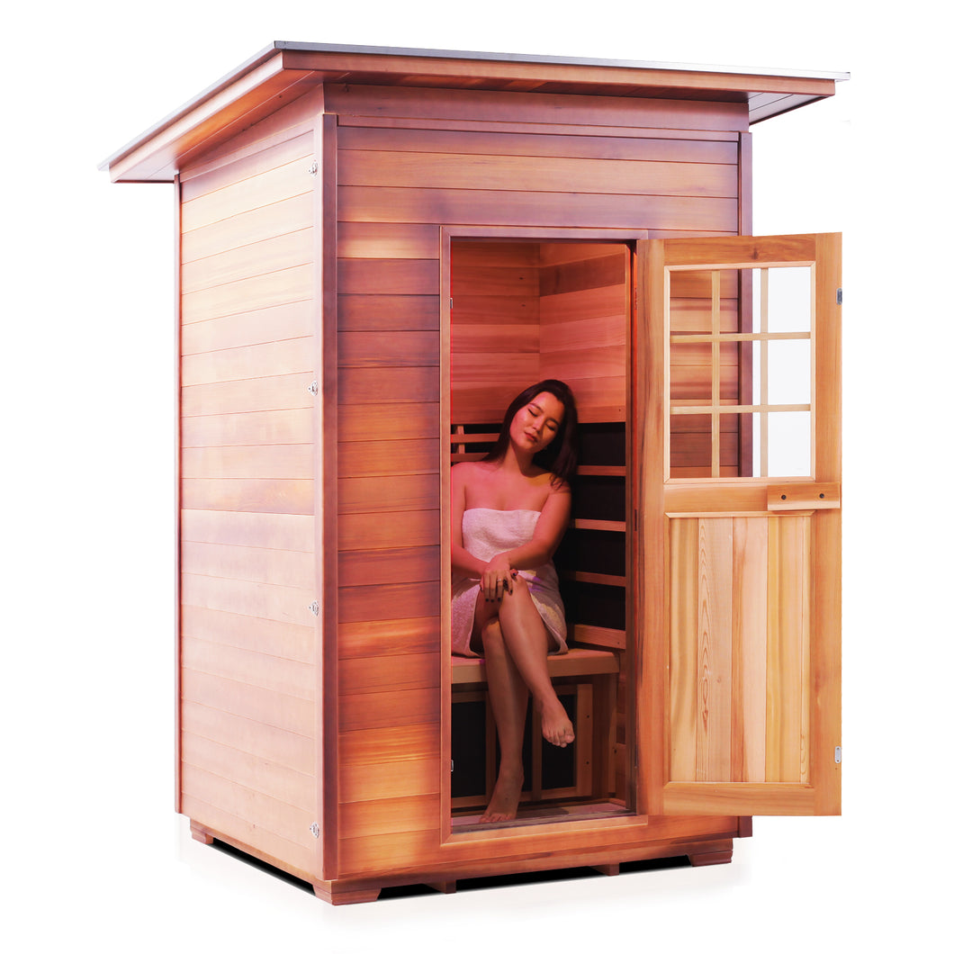 Enlighten Sauna Sierra 2 Person Slope Roof with woman inside facing right in a white background